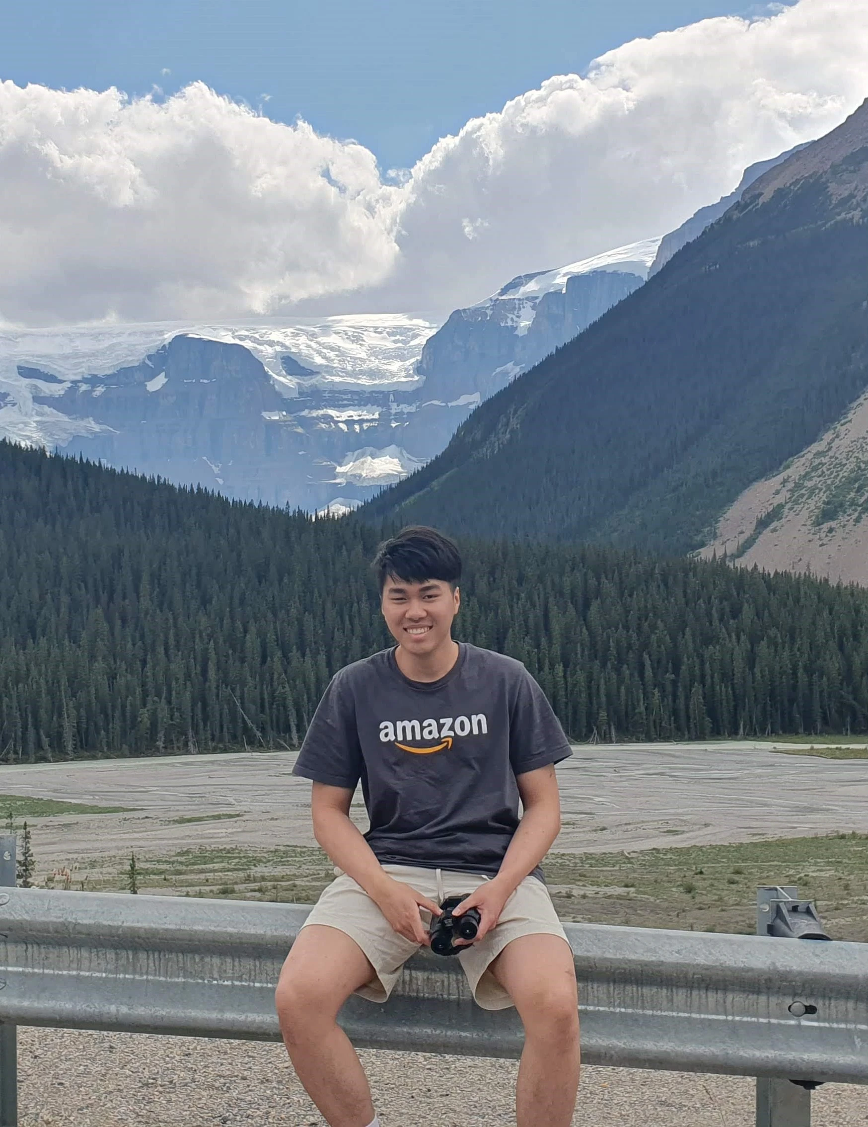 Me wearing an Amazon t-shirt with Columbia Icefields in the background during my vacation to Banff, Alberta.